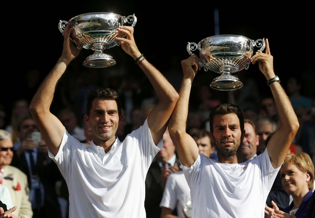 2015-07-11T173054Z_393431436_LR2EB7B1CN8W6_RTRMADP_2_TENNIS-WIMBLEDON