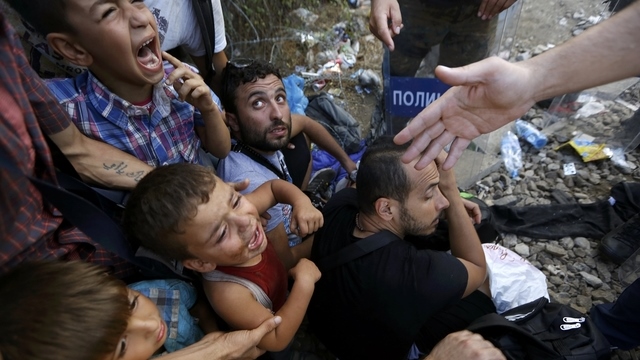 2015-08-21T221422Z_2035432342_LR2EB8L1PRN6O_RTRMADP_2_EUROPE-MIGRANTS-MACEDONIA(1)