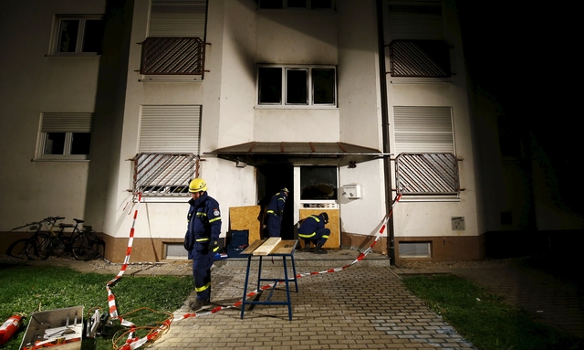 2015-09-04T040231Z_1110542523_GF10000192594_RTRMADP_2_EUROPE-MIGRANTS-GERMANY-FIRE