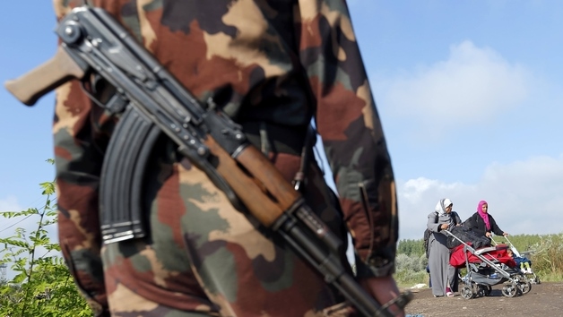 2015-09-12T121845Z_1085604879_LR2EB9C0Y6Y66_RTRMADP_2_EUROPE-MIGRANTS-HUNGARY