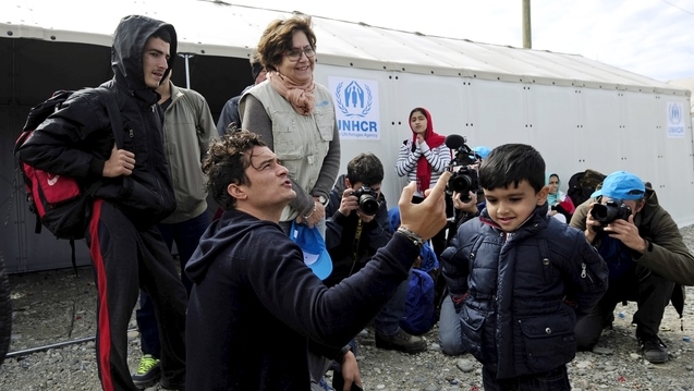 2015-09-29T122219Z_837881519_GF10000226202_RTRMADP_2_EUROPE-MIGRANTS-MACEDONIA