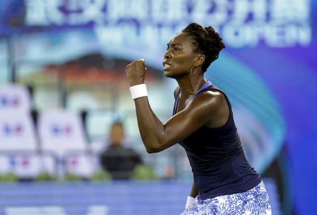 2015-10-02T041259Z_842046637_GF10000229569_RTRMADP_2_TENNIS-WOMEN-WUHAN