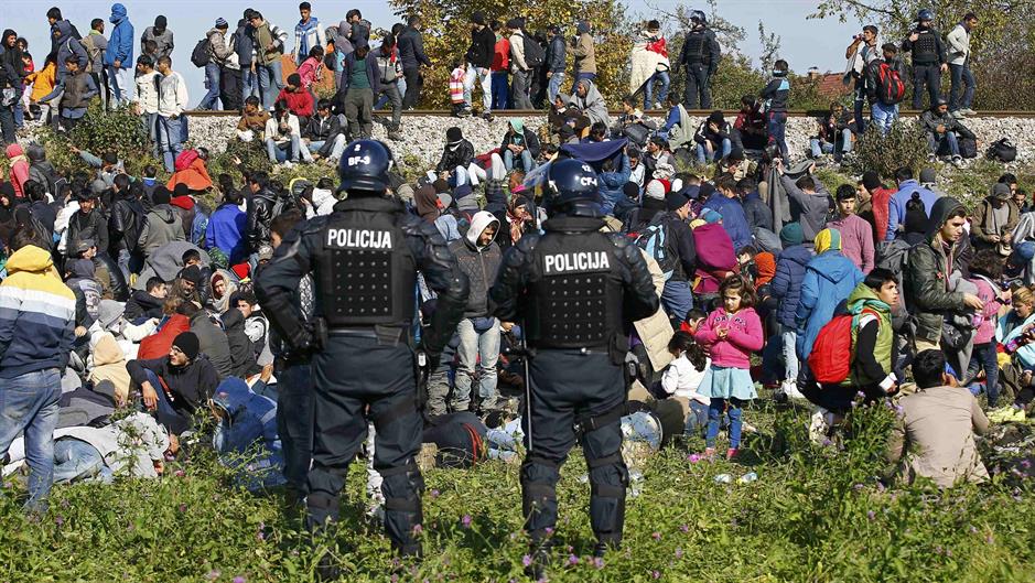 2015-10-21T123523Z_87266804_LR1EBAL0YYO7G_RTRMADP_3_EUROPE-MIGRANTS-SLOVENIA