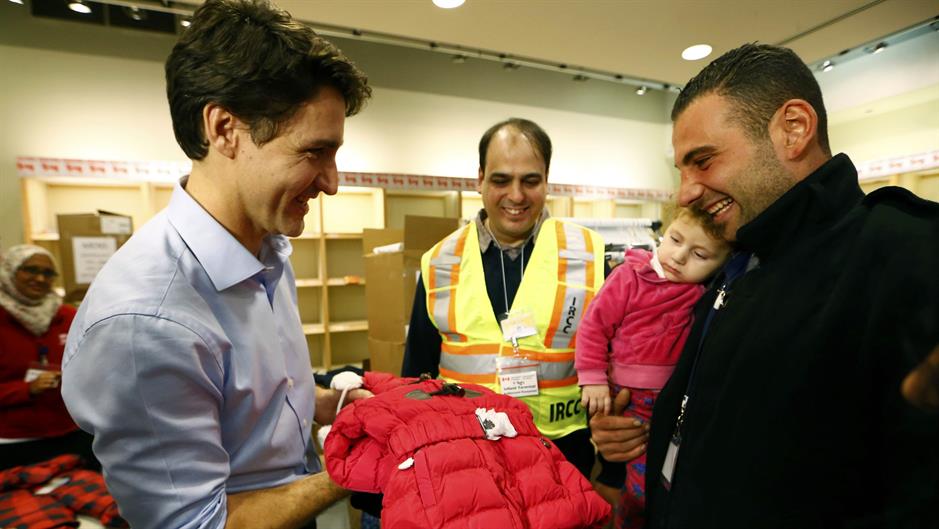 2015-12-11T064431Z_685609398_TB3EBCB0IPW3M_RTRMADP_3_CANADA-SYRIA-MIGRANTS
