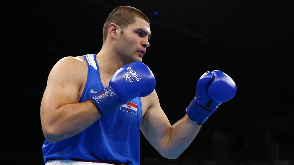 2016-08-13T171115Z_413026296_RIOEC8D1BQPH1_RTRMADP_3_OLYMPICS-RIO-BOXING-M-SUPERHEAVY