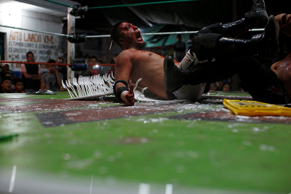 2016-11-18T142821Z_969752422_D1BEUNOCWBAA_RTRMADP_3_MEXICO-WRESTLING