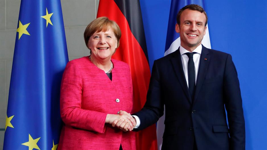 2017-05-15T174147Z_57064351_RC11735C8AD0_RTRMADP_3_GERMANY-FRANCE-LEADERS