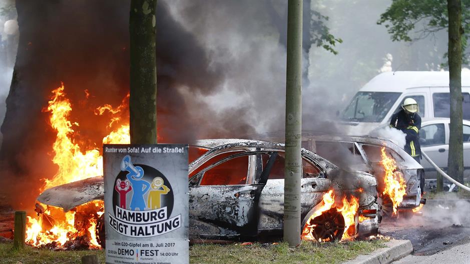 2017-07-07T061154Z_1437988778_UP1ED770H7TH7_RTRMADP_3_G20-GERMANY-PROTEST