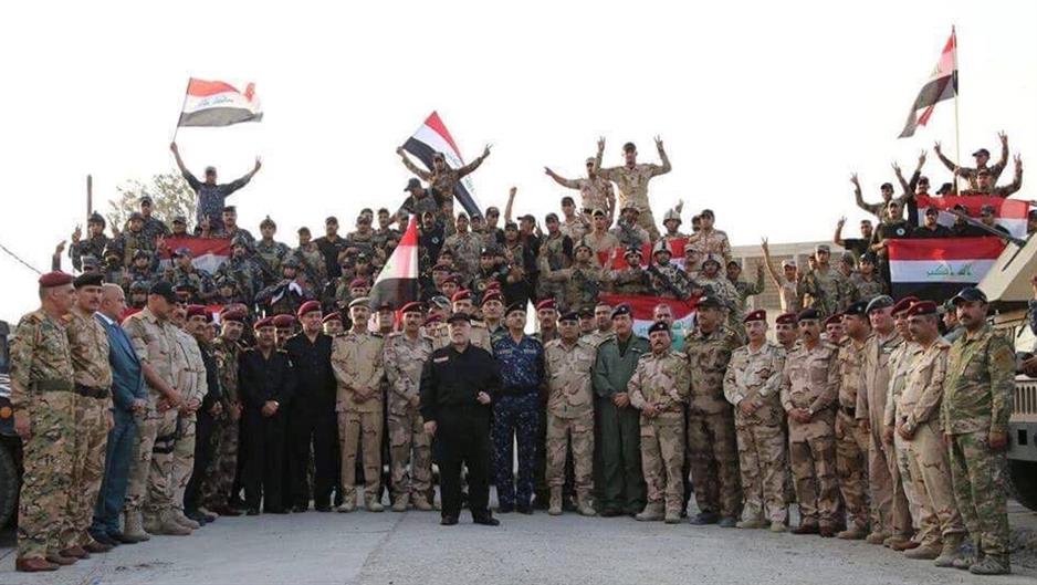 2017-07-10T164630Z_1649612710_RC14C4CE2630_RTRMADP_3_MIDEAST-CRISIS-IRAQ-ABADI