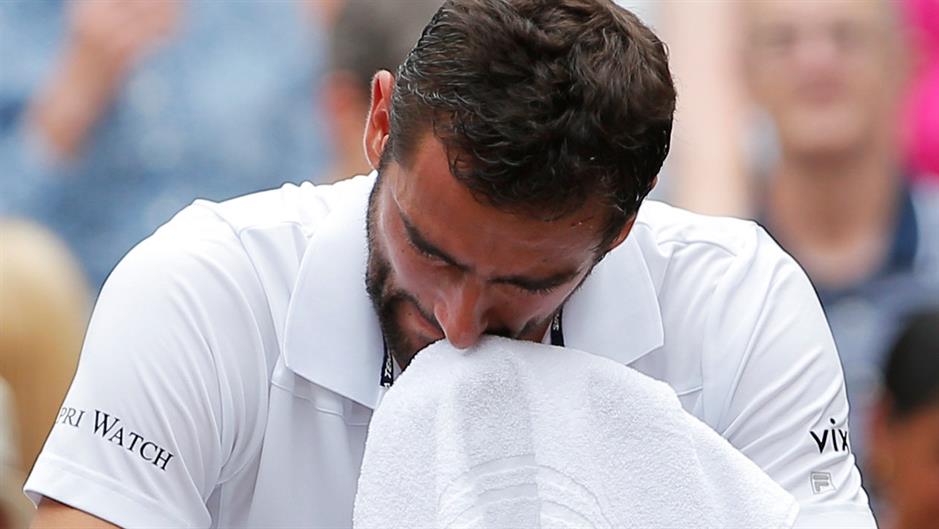 2017-07-16T140712Z_569045604_RC16D818D950_RTRMADP_3_TENNIS-WIMBLEDON(1)