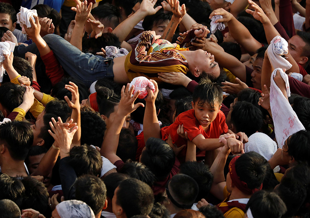 2018-01-09T114156Z_183820829_RC168A89F860_RTRMADP_3_RELIGION-PHILIPPINES