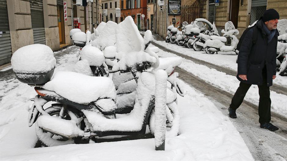 2018-02-26T103217Z_82992221_RC1683DB39D0_RTRMADP_3_EUROPE-WEATHER-ITALY