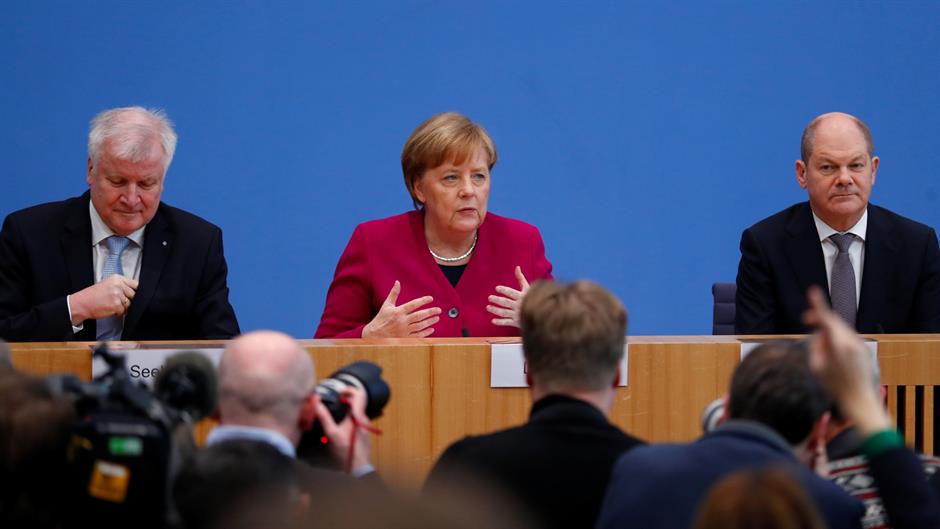 2018-03-12T112447Z_1524870996_RC19000F5D60_RTRMADP_3_GERMANY-POLITICS-COALITION