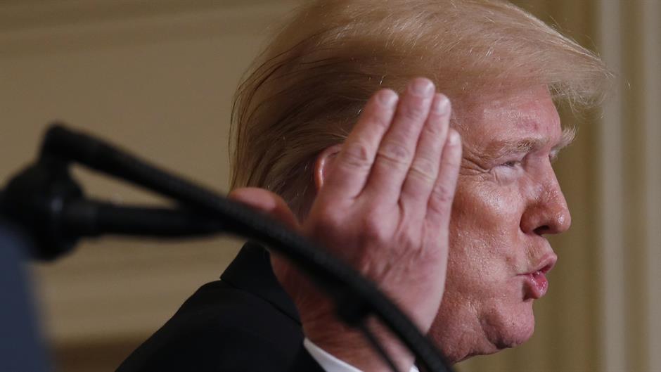 2018-04-03T183540Z_373638793_HP1EE431FNFFD_RTRMADP_3_USA-TRUMP