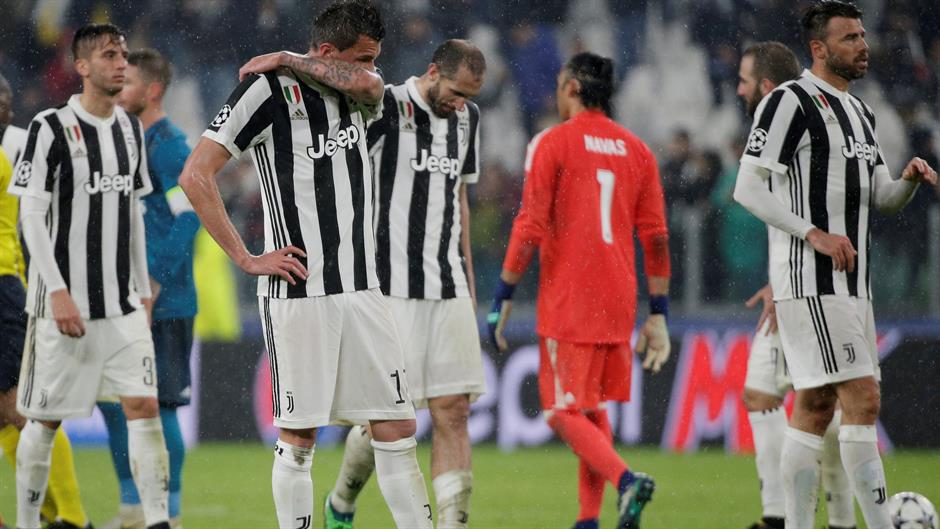 2018-04-03T204408Z_1435456516_RC1EC07DEA30_RTRMADP_3_SOCCER-CHAMPIONS-JUV-MAD