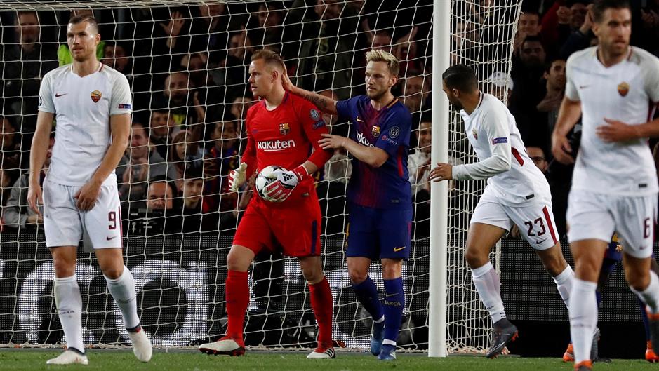 2018-04-04T205817Z_1683818524_RC12FAC536D0_RTRMADP_3_SOCCER-CHAMPIONS-FCB-ROM