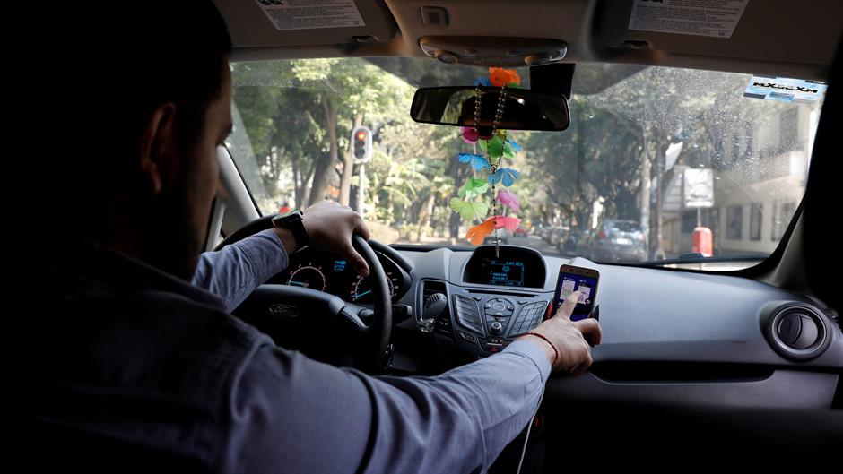 2018-04-06T181616Z_616978464_RC1B9CD1D2E0_RTRMADP_3_DIDI-MEXICO