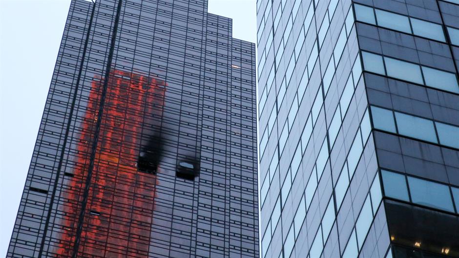 2018-04-08T001856Z_2053155388_RC1E8AE95240_RTRMADP_3_NEW-YORK-FIRE-TRUMPTOWER