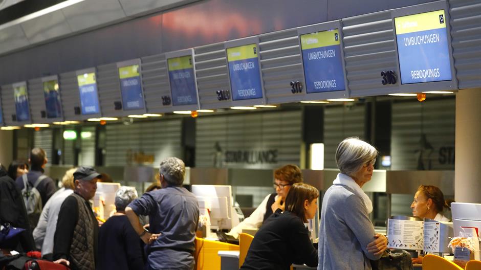 2018-04-10T045136Z_999493409_UP1EE4A0DHZ21_RTRMADP_3_GERMANY-WAGES