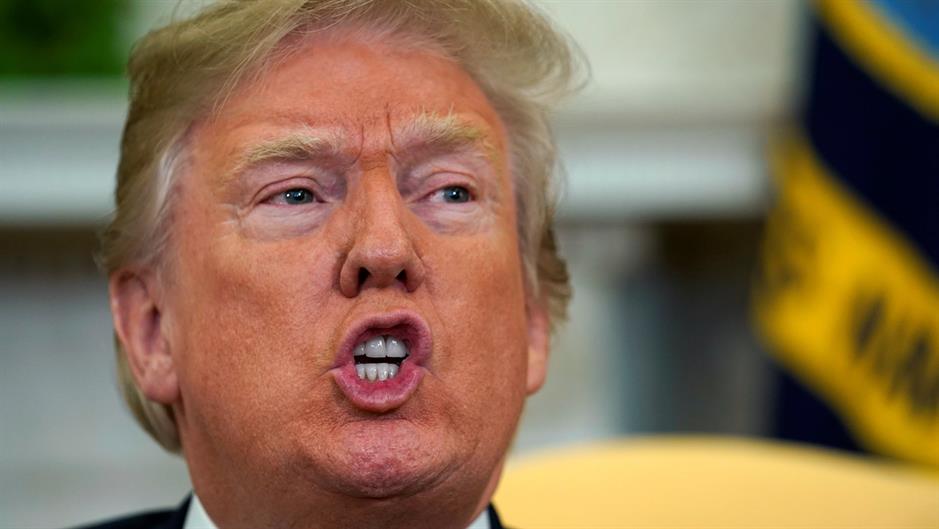 2018-04-10T163240Z_789680166_RC125992CA00_RTRMADP_3_USA-QATAR-TRUMP