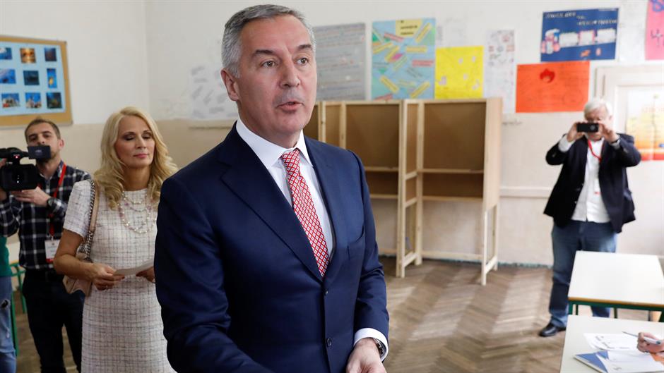 2018-04-15T110458Z_117958408_RC1E21CFFBC0_RTRMADP_3_MONTENEGRO-ELECTION-CANDIDATES