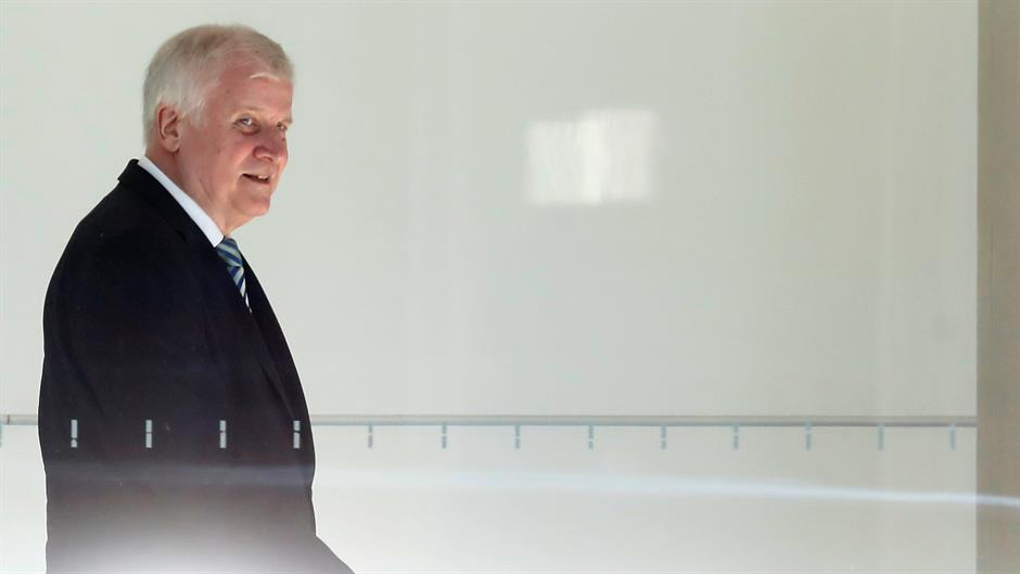 2018-06-14T131631Z_1630522247_RC1DEFF0B820_RTRMADP_3_EUROPE-MIGRANTS-GERMANY