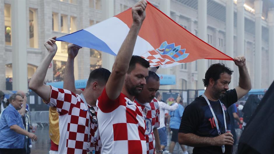 2018-07-15T184954Z_1510385636_UP1EE7F1GB5BZ_RTRMADP_3_SOCCER-WORLDCUP-FINAL-FANS-REACTIONS