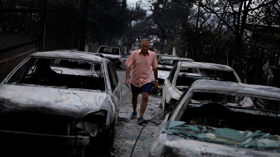 2018-07-24T062542Z_743188330_RC192A3E5F70_RTRMADP_3_GREECE-WILDFIRE