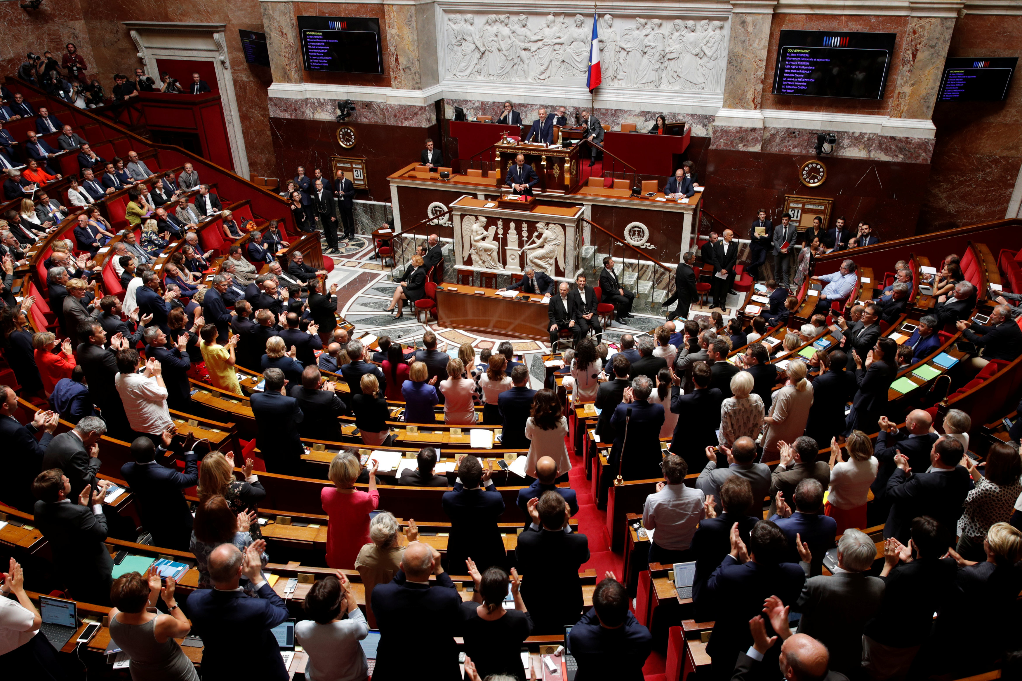 2018-07-31T134008Z_950007476_RC1465351F90_RTRMADP_3_FRANCE-MACRON-AIDE