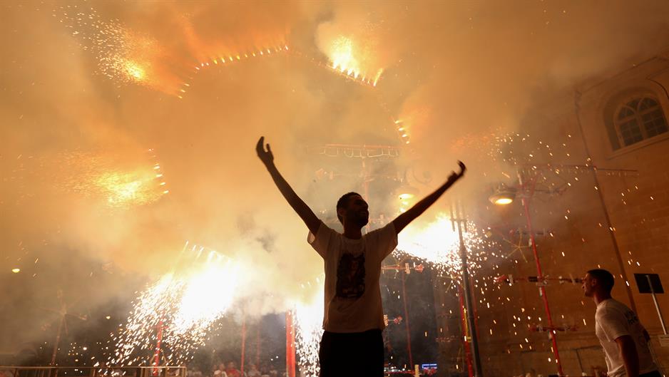 2018-08-15T005044Z_915684260_RC1896F31200_RTRMADP_3_MALTA-RELIGION