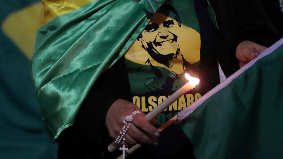 2018-09-06T235308Z_1324868870_RC1D6B2BD550_RTRMADP_3_BRAZIL-ELECTION-BOLSONARO