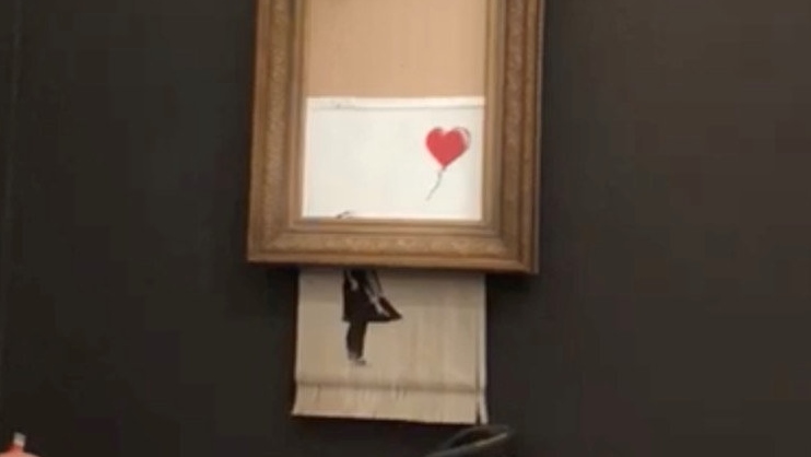 2018-10-06T120156Z_414895248_RC1C9CA3C490_RTRMADP_3_ART-BANKSY