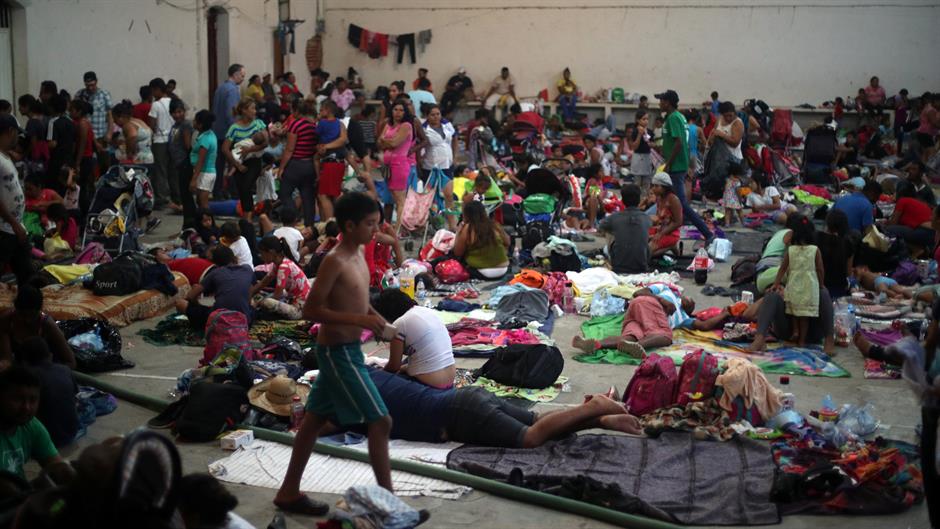 2018-10-30T042857Z_1390742016_RC1F15CA2C40_RTRMADP_3_USA-IMMIGRATION-CARAVAN