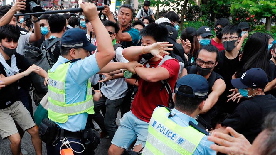 2019-07-13T103701Z_1558097190_RC17C3C35E20_RTRMADP_3_HONGKONG-EXTRADITION-MARCH