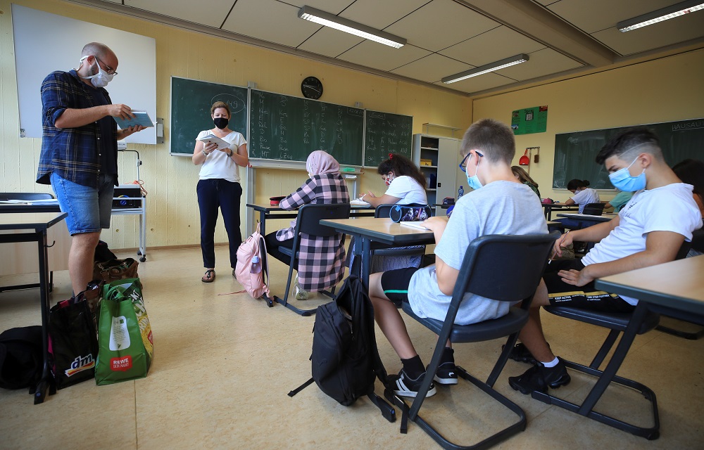 2020-08-12T091118Z_1450689682_RC29CI9MMIT9_RTRMADP_3_HEALTH-CORONAVIRUS-GERMANY-EDUCATION