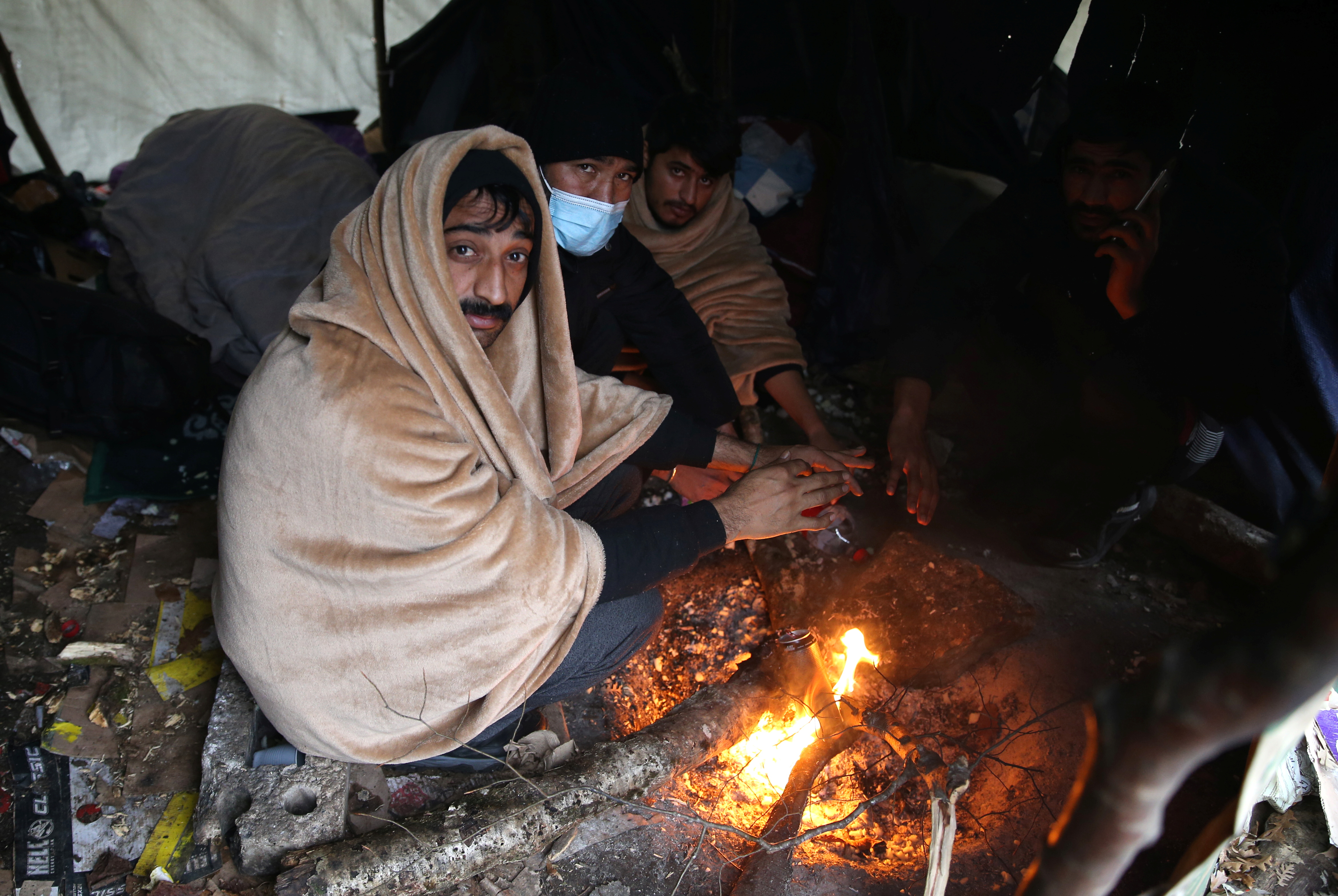 2020-12-24T095928Z_1768311749_RC2LTK9G7VGN_RTRMADP_3_EUROPE-MIGRANTS-BOSNIA-AFTERMATH