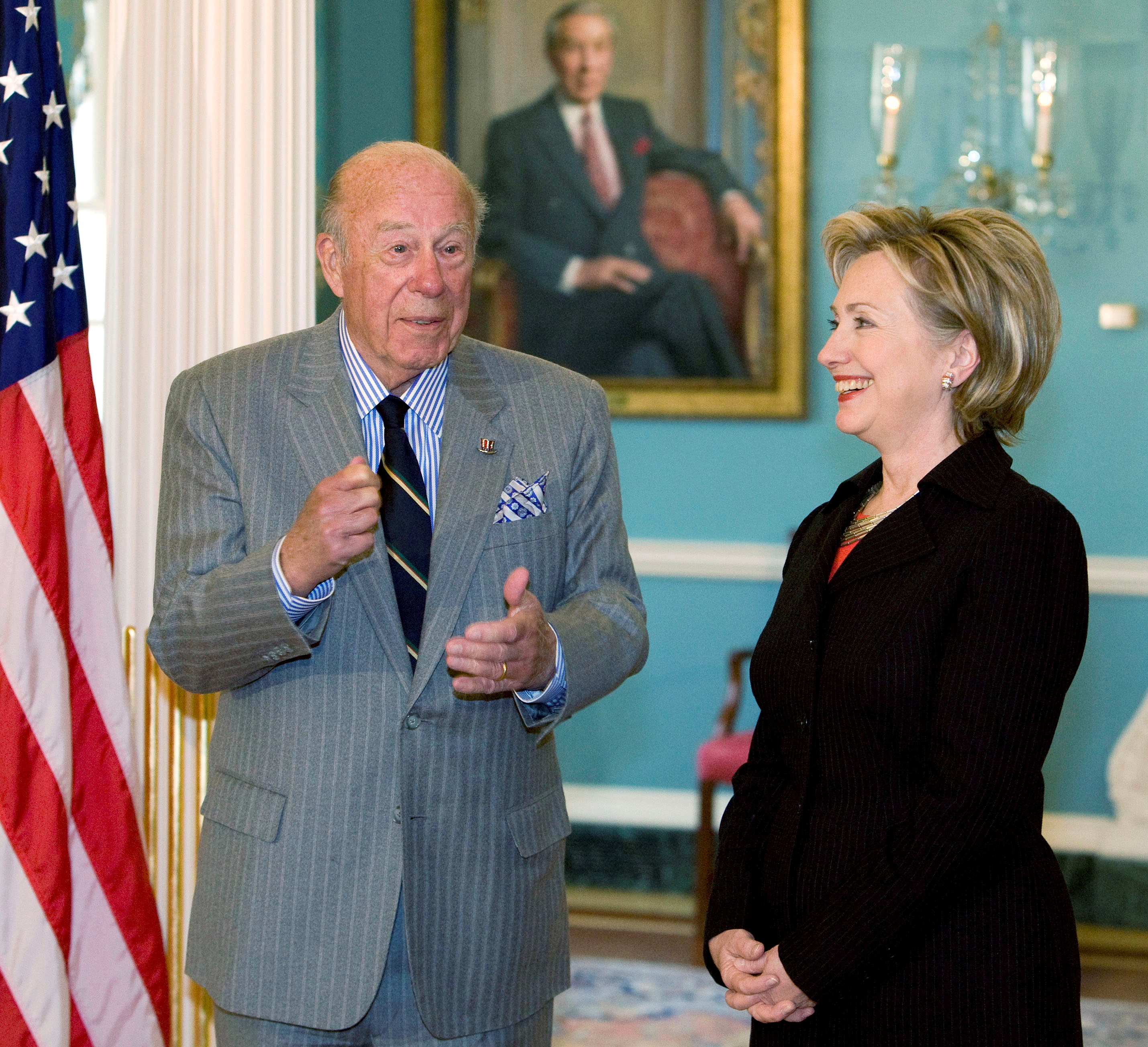 FILE PHOTO: U.S. Secretary of State Hilary Clinton meets with former Secretary of State Shultz in Washington