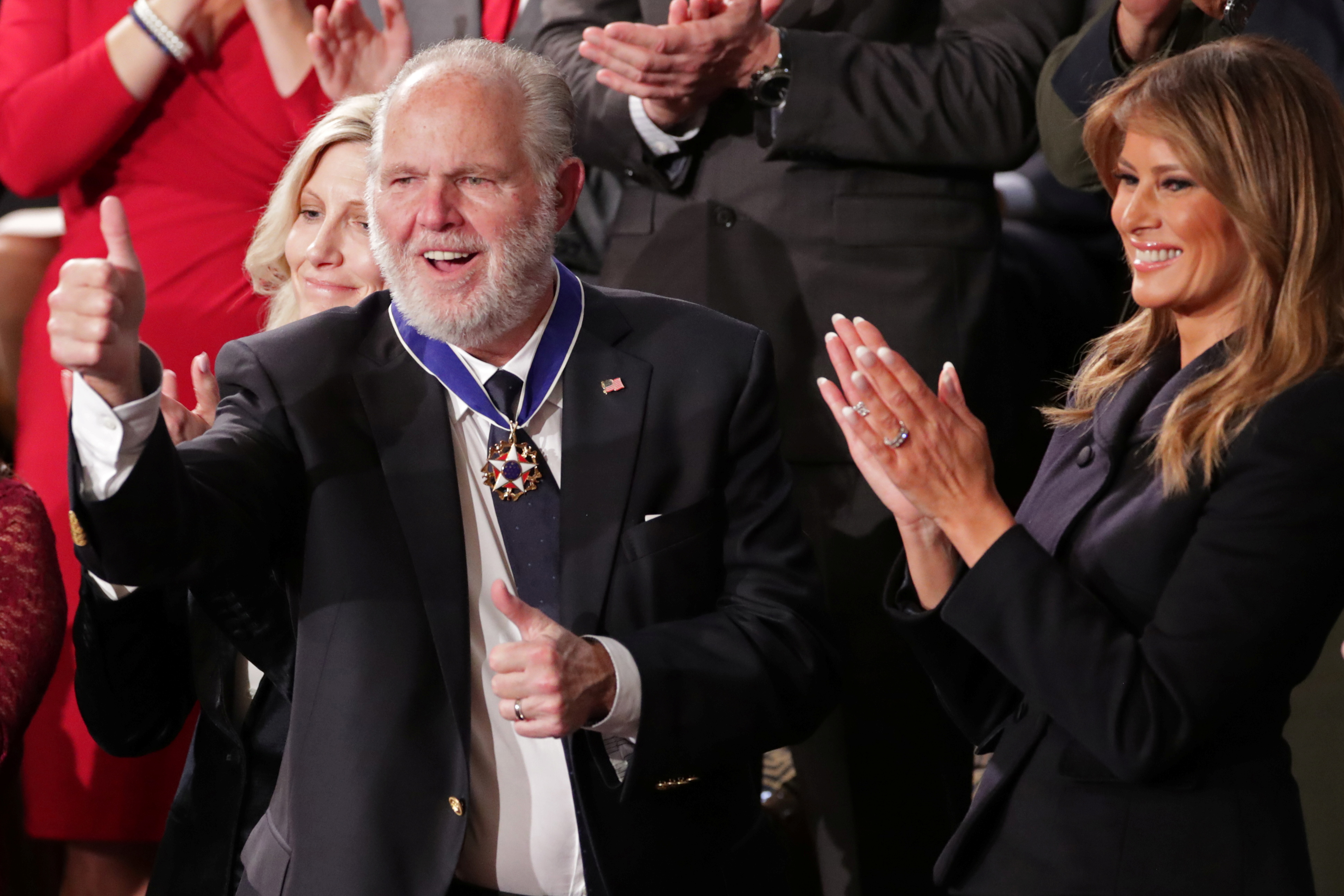Rush Limbaugh FILE PHOTO: Conservative radio talk show host Rush Limbaugh reacts as he is awarded the Presidential Medal of Freedom in Washington