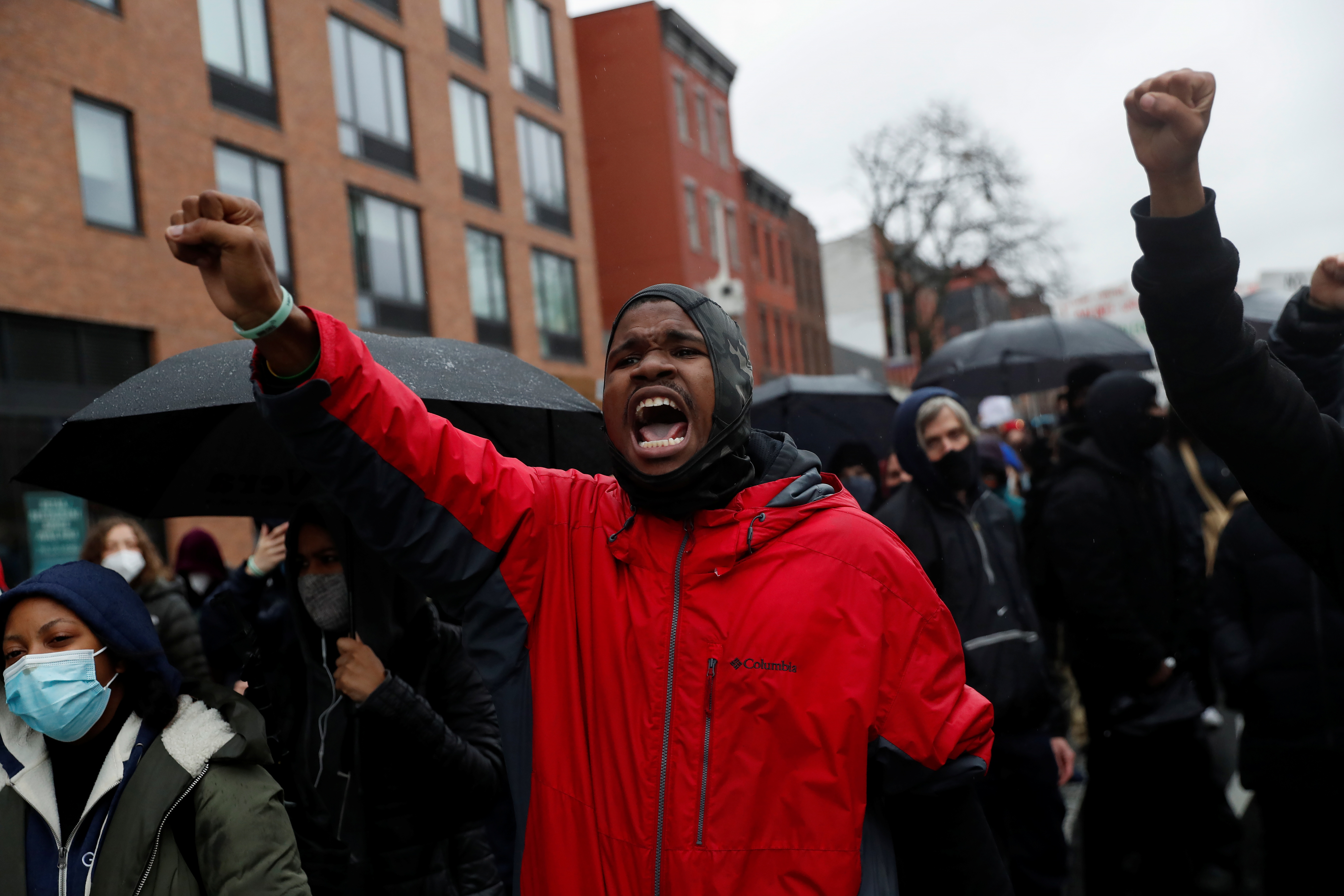 People march during a rally for Daunte Wright, who police allegedly shot and killed during a traffic stop Sunday at a suburb north of Minneapolis, in the Brooklyn borough of New York City