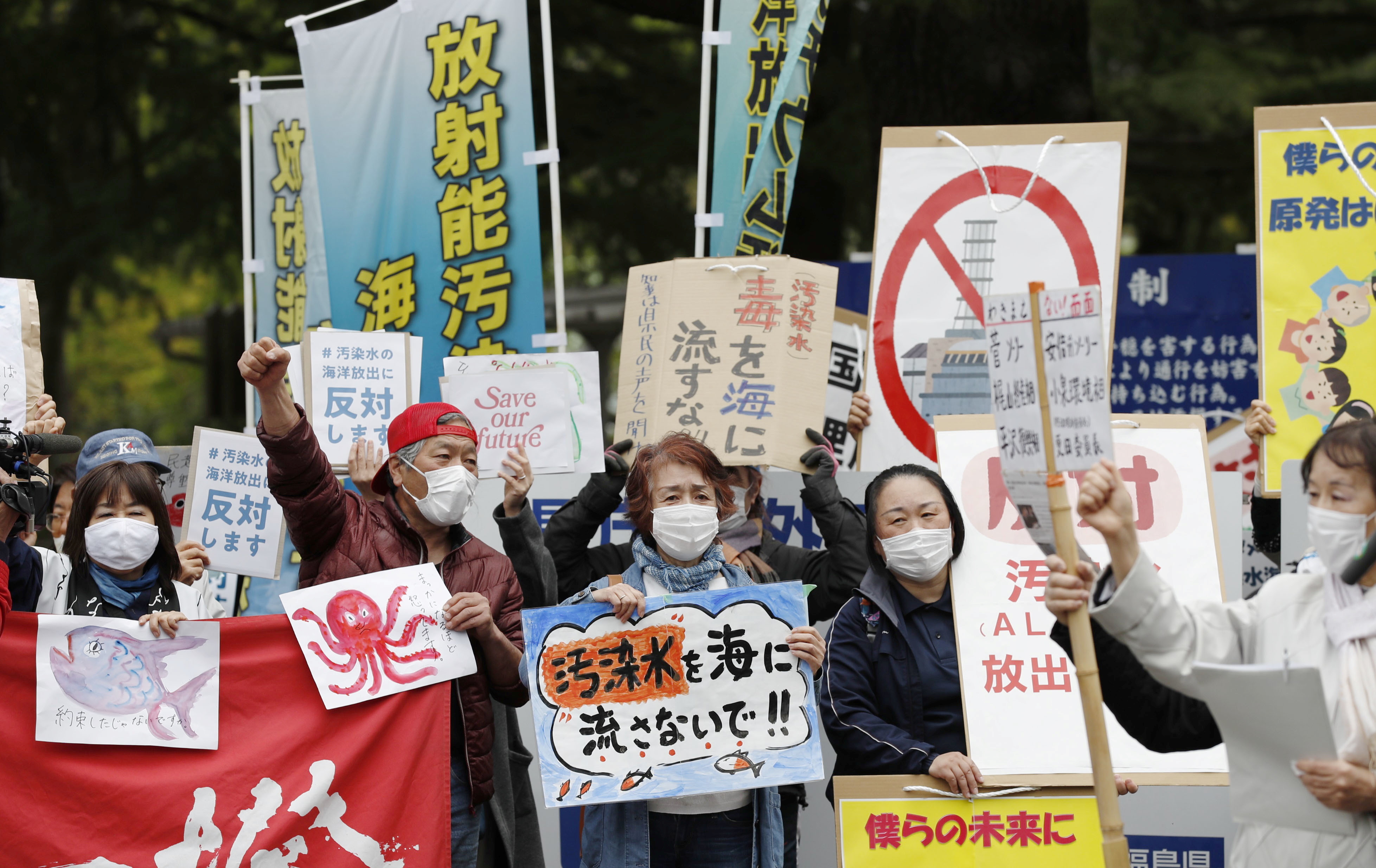 People protest against Japanese government's decision to discharge contaminated radioactive wastewater from Fukushima Daiichi nuclear power plant into the sea in Fukushima