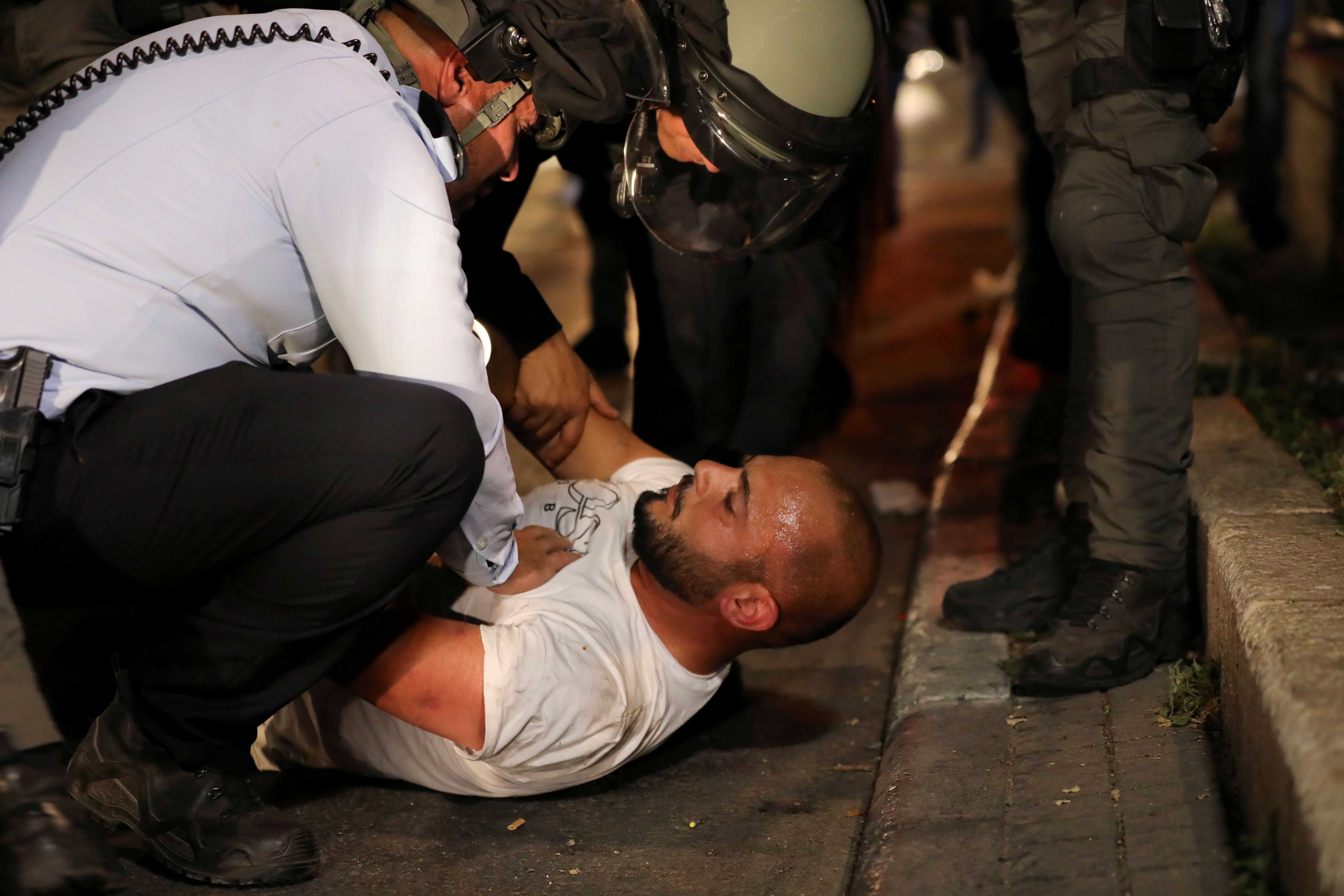 FILE PHOTO: Palestinians clash with Israeli police during the Muslim holy fasting month of Ramadan