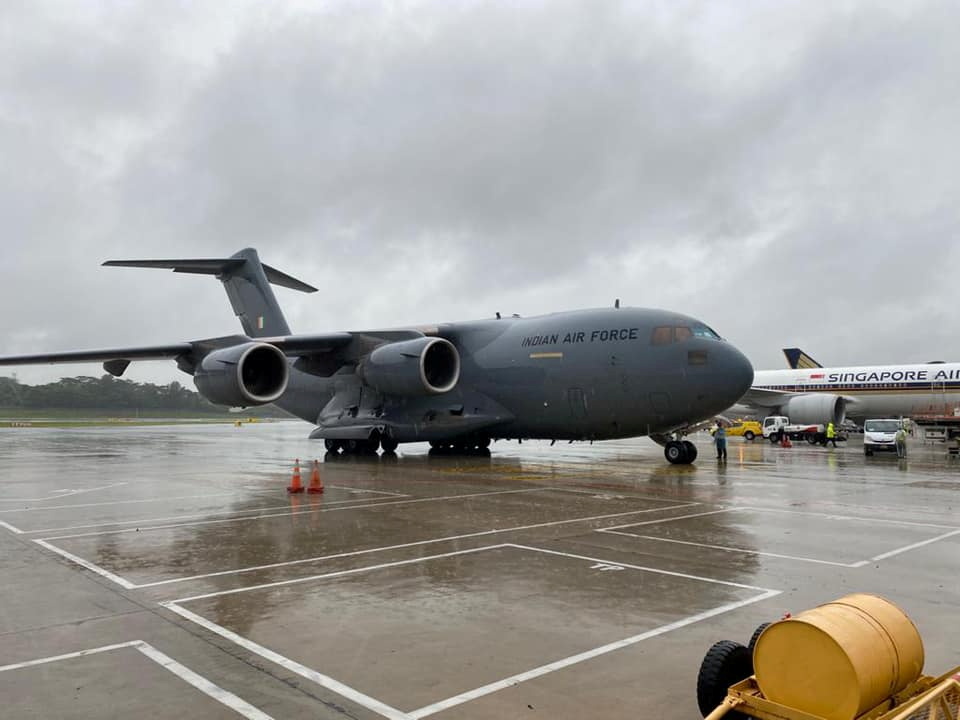Aircraft carrying oxygen tankers from Singapore to supply hospitals in India is pictured at Changi Airport