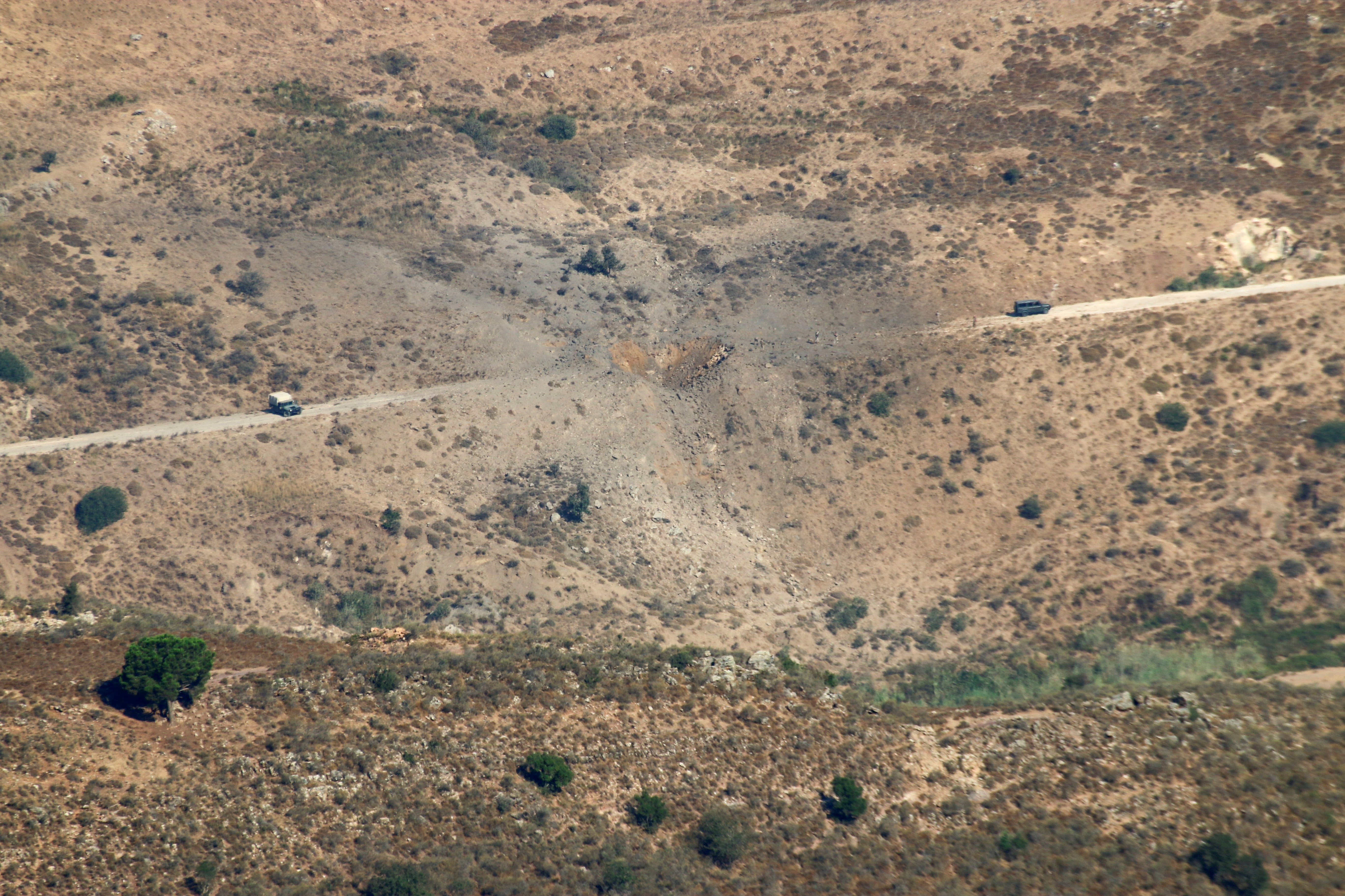 FILE PHOTO: A view shows the damage in the aftermath of Israeli air strikes as seen from Marjayoun