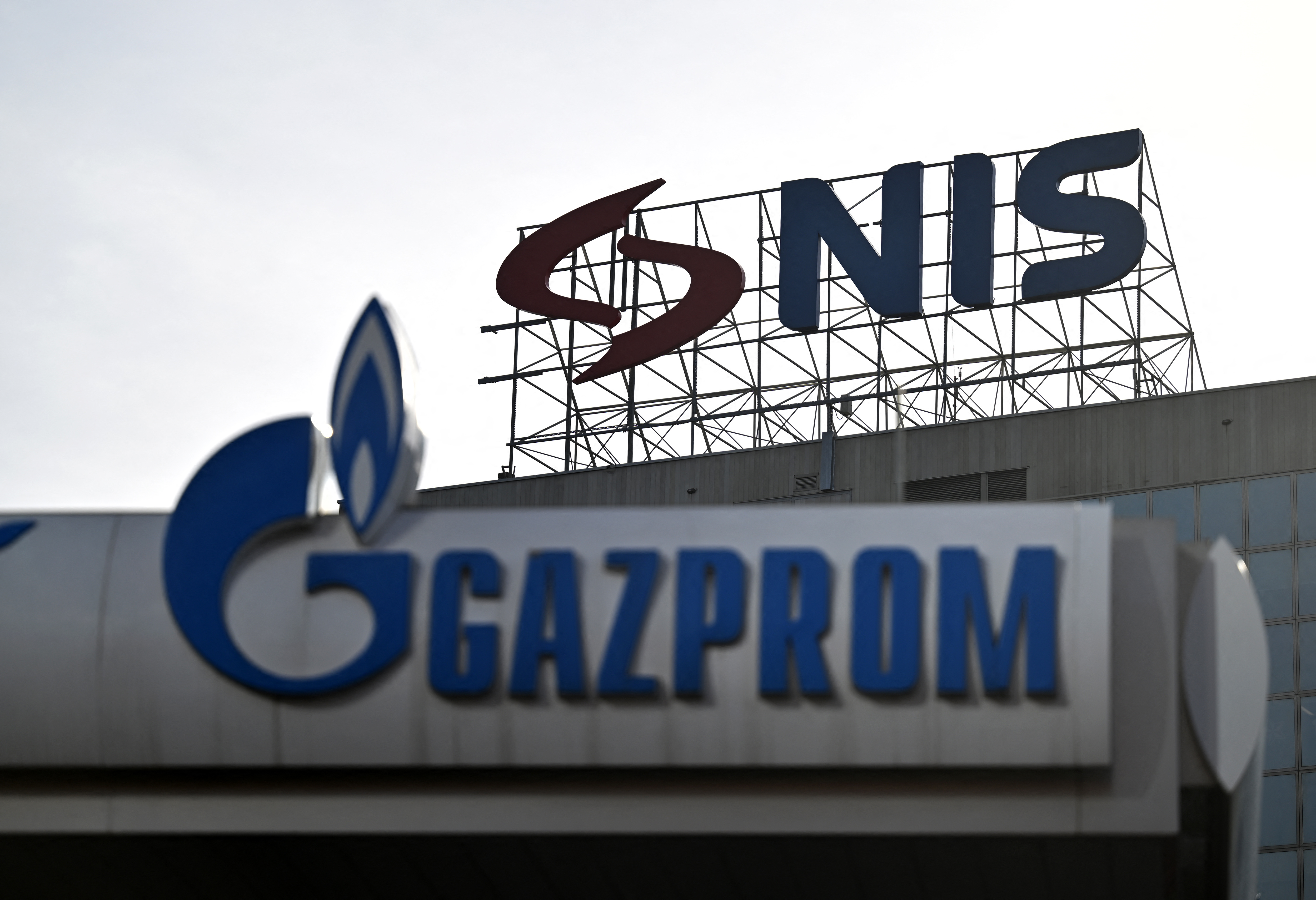 This photograph shows a sign for Naftna Industrija Srbije AD (NIS), and the company's owner OAO Gazprom Neft outside the headquarters in Belgrade