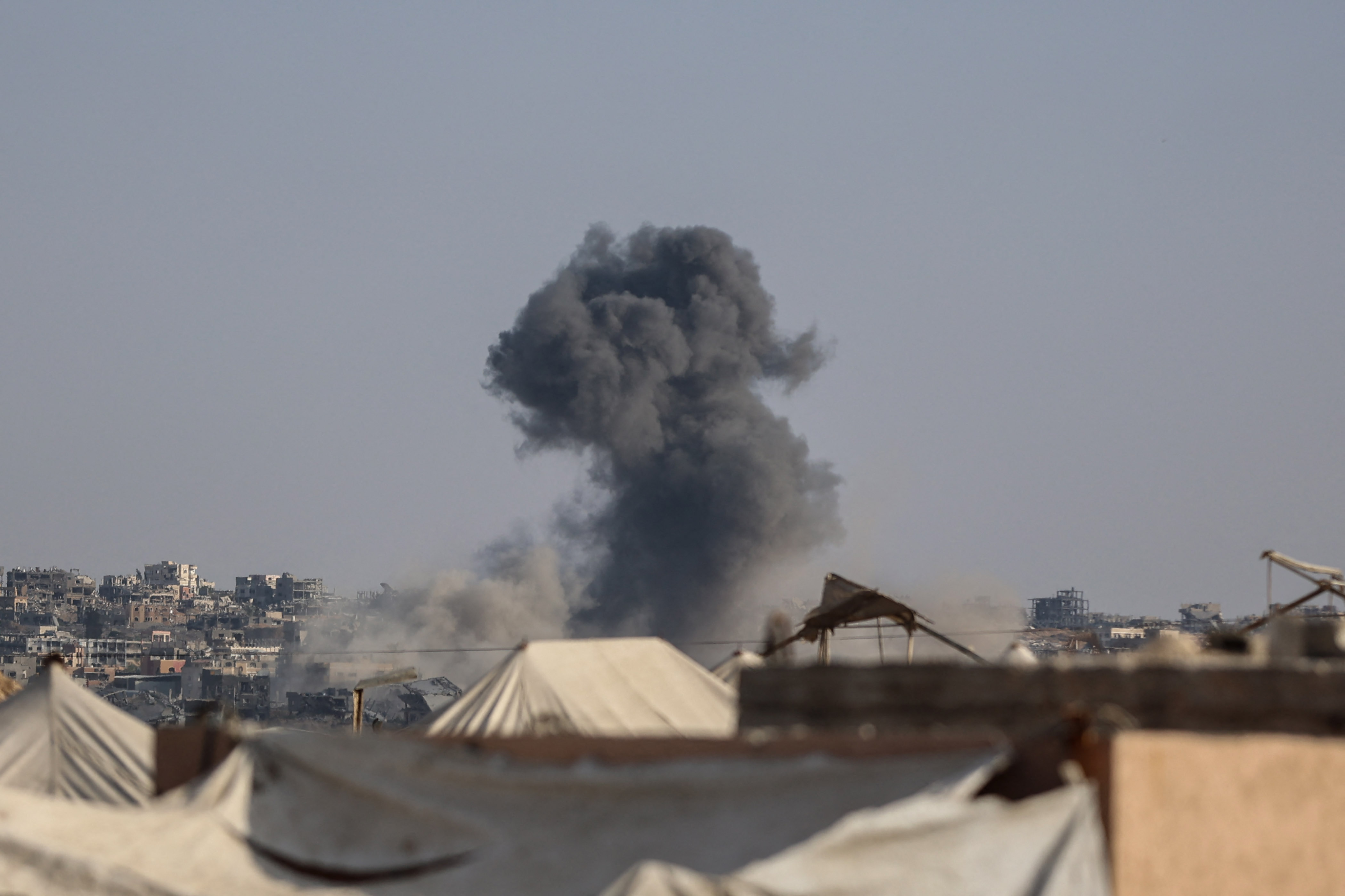 Smoke billows following an Israeli strike in Khan Yunis in the southern Gaza Strip, on September 29, 2025, amid the ongoing conflict between Israel and the Palestinian militant group Hamas.