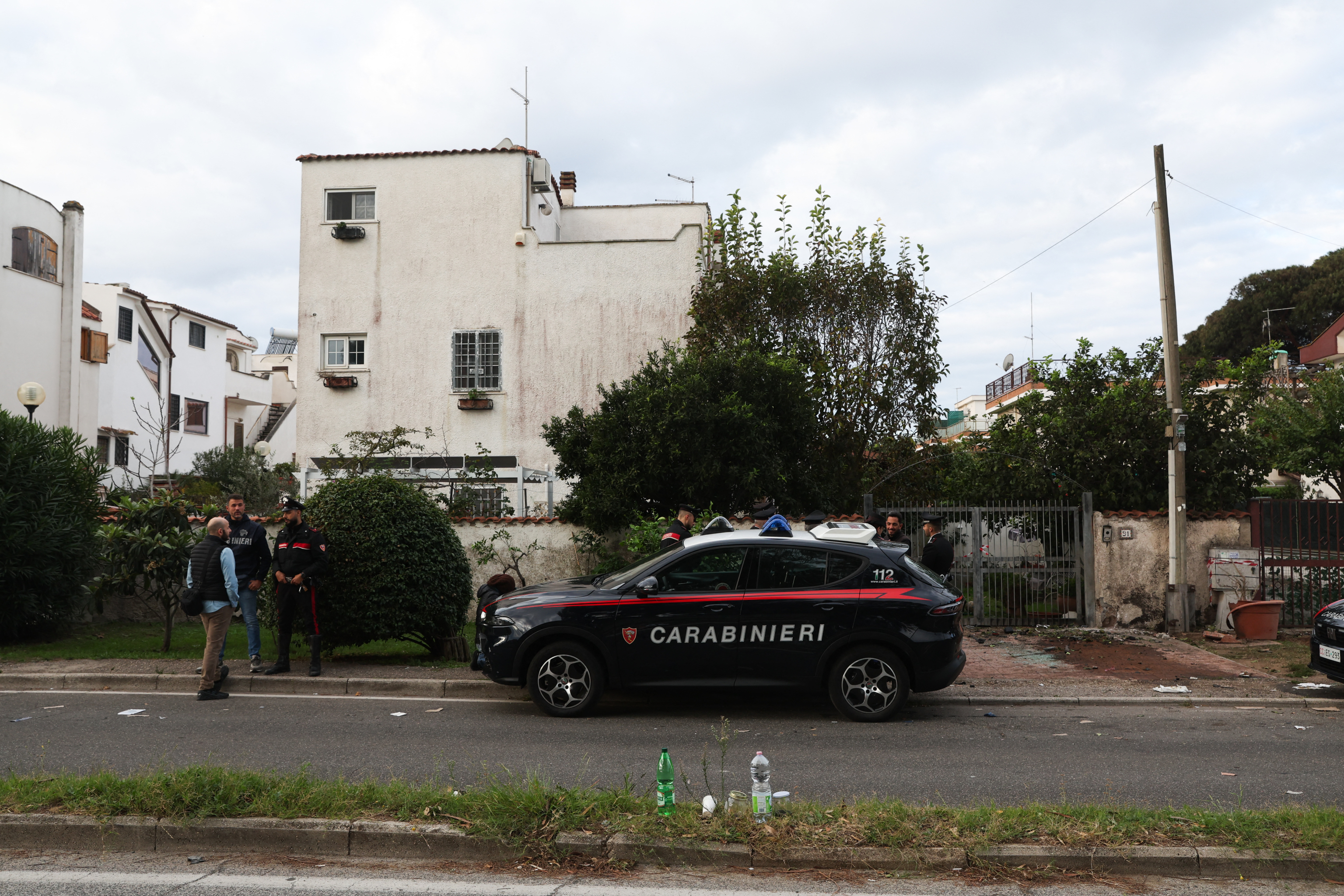 Italian Carabinieri stand guard in front of the residence of Italian journalist of TV investigative television news show 'Report',  / ----IMAGE RESTRICTED TO EDITORIAL USE - STRICTLY NO COMMERCIAL USE-----