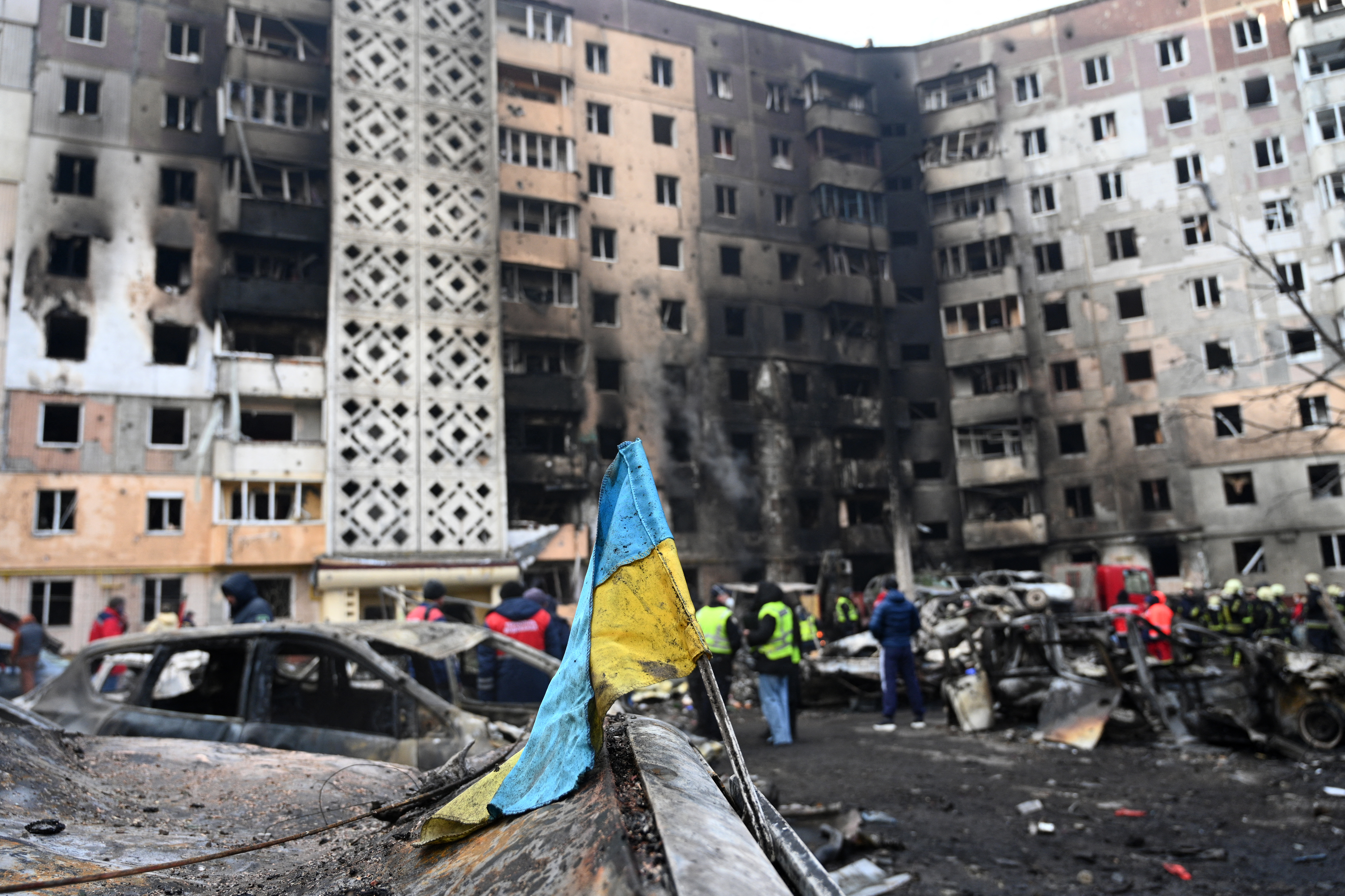 A Ukrainian flag attached to a burned car following Russian air strike in the city of Ternopil, on November 19, 2025