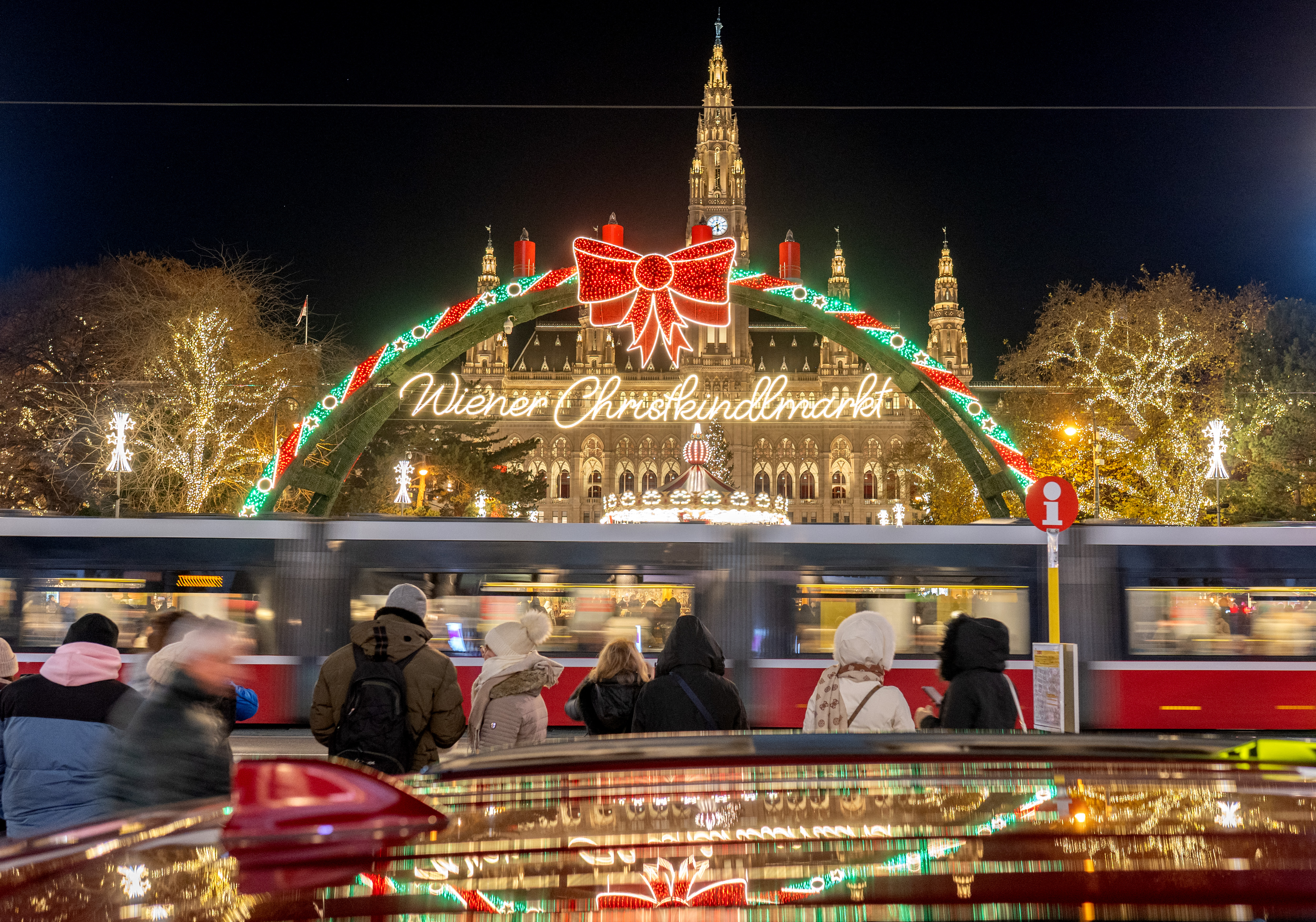 A tram passes outside of the Christmas market outside of the Vienna’s City Hall in Vienna, Austria on November 27, 2025. (Photo by Joe Klamar / AFP)