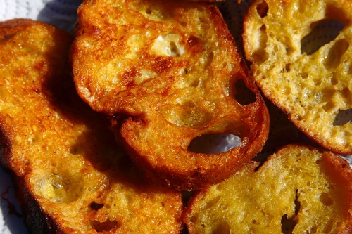 On the table. Breads fried with egg.
