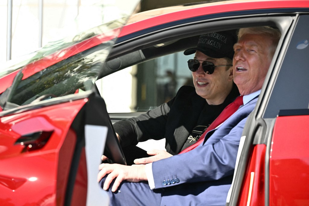 US President Trump unveils a Tesla car at the White House